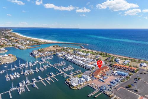 an aerial view of a marina with a stop sign at All Decked Out, Geographe Marina in Busselton