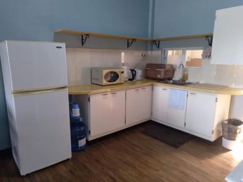Kuchyň nebo kuchyňský kout v ubytování lee's home2