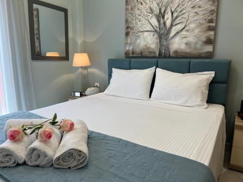 Posteľ alebo postele v izbe v ubytovaní Kavala Port Apartments