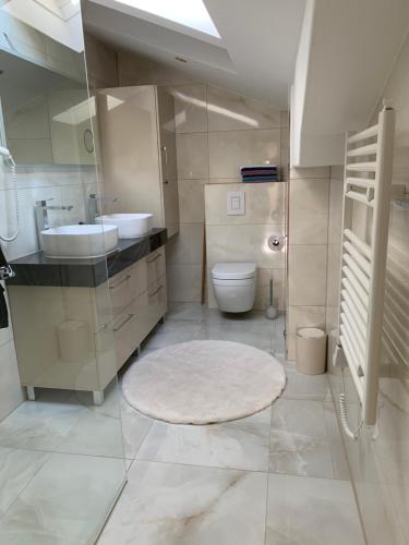 Kúpeľňa v ubytovaní Appartements Belli