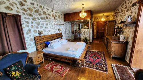 a bedroom with a large bed in a room at Beso Patara in Patara