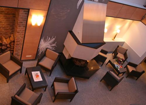 Posezení v ubytování Gut Heckenhof Hotel & Golfresort an der Sieg GmbH & Co. KG