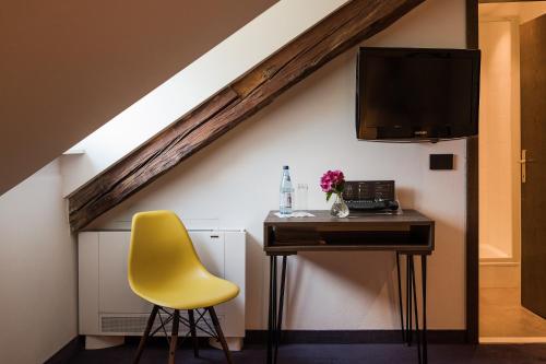 TV a/nebo společenská místnost v ubytování Hotel Mandelhof