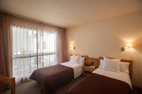  Hotel Bonavida -  Room  picture :   Bath    Safety deposit box    TV                           