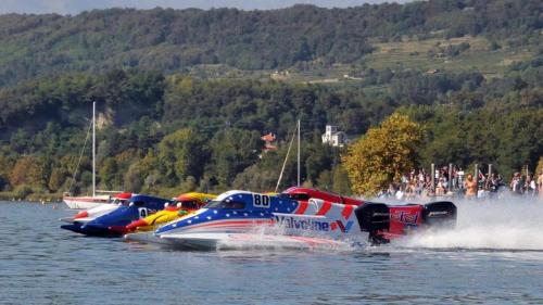 a group of speed boats on the water at Turismo Associativo Giovanile asd bidrino in Borgofranco dʼIvrea