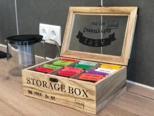 a wooden box filled with different colored sticky notes at Direct Moselle view 200m² 4 SZ 10Pers Terrace in Sankt Aldegund