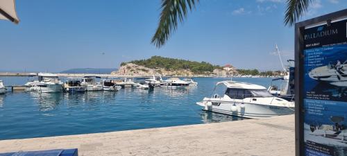 a bunch of boats docked in a harbor at Villa Palladium in Makarska