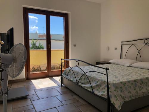 Katil atau katil-katil dalam bilik di Gold House Luxury Anzio