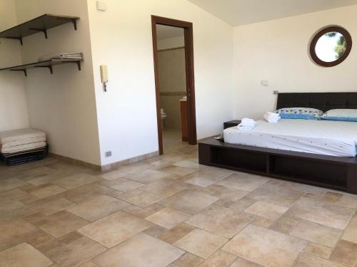Katil atau katil-katil dalam bilik di Gold House Luxury Anzio