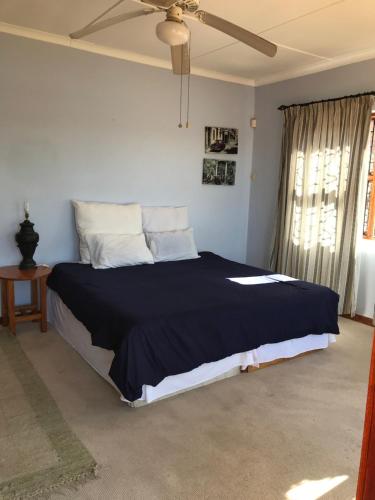 Letto o letti in una camera di Riverfront Homestay