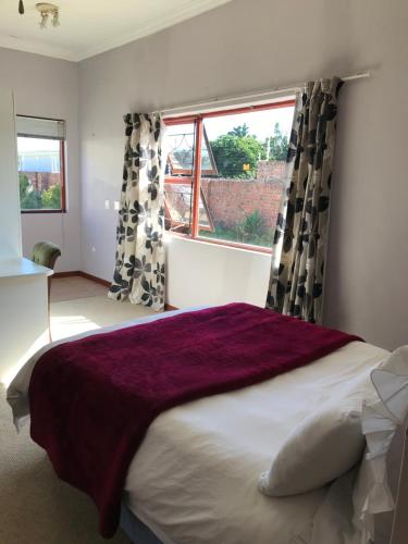 Letto o letti in una camera di Riverfront Homestay