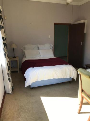 Letto o letti in una camera di Riverfront Homestay