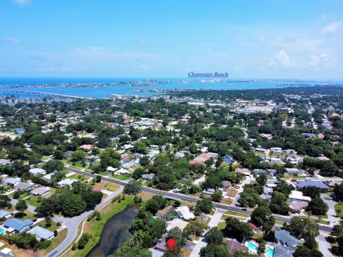 an aerial view of a town with houses and the ocean at CasaBreeze Cozy Creek House/IRB&Clearwater Beach! in Largo