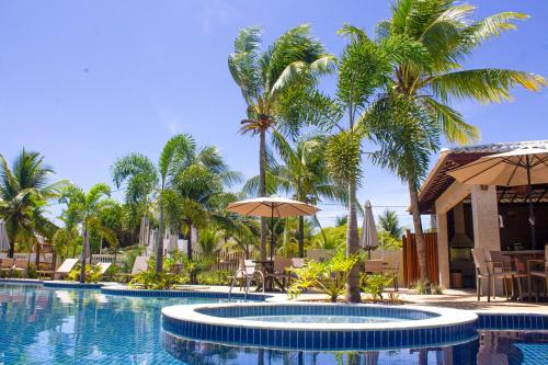 Hồ bơi trong/gần Village em Itacimirim 5km Praia forte e Guarajuba.