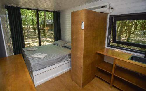 Postel nebo postele na pokoji v ubytování Chateau Vartsikhe