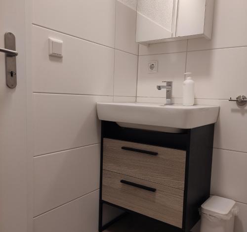 a bathroom with a sink and a toilet at 2 Zimmerwohnung in Bietingen in Gottmadingen