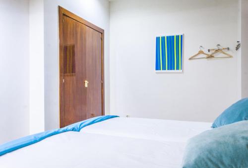 Ένα ή περισσότερα κρεβάτια σε δωμάτιο στο Mola Suites