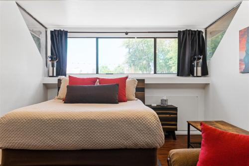 a bedroom with a large bed and a window at Nightlife & Shop Old Town Scottsdale - Studio Unit in Scottsdale