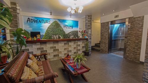 a lobby of a hotel with a waiting room at Hotel Machupicchu Adventure in Machu Picchu
