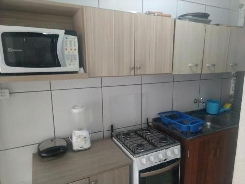 Køkken eller tekøkken på Casa Temporada - 2 Quartos