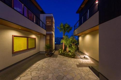 an empty courtyard of a building at night at J1 wellness - Vacation STAY 69561v in Tateyama