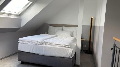 Ένα ή περισσότερα κρεβάτια σε δωμάτιο στο The Stay.residence