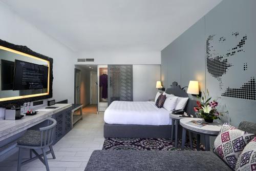 Postel nebo postele na pokoji v ubytování Hard Rock Hotel Bali