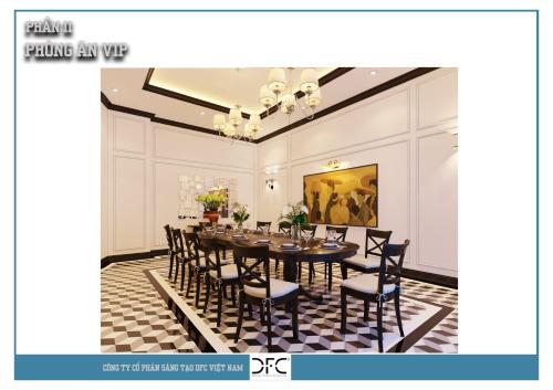 a dining room with a table and chairs at Khách sạn Robin Gia Nghĩa in Gia Nghĩa
