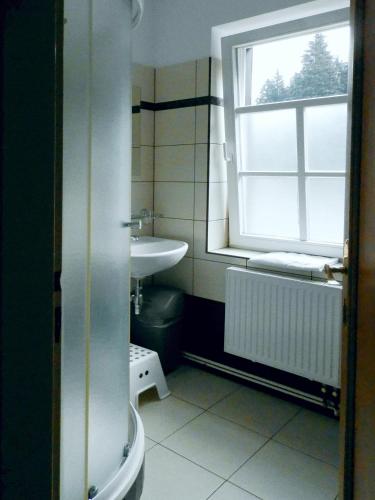 Ein Badezimmer in der Unterkunft Hotel Hradec