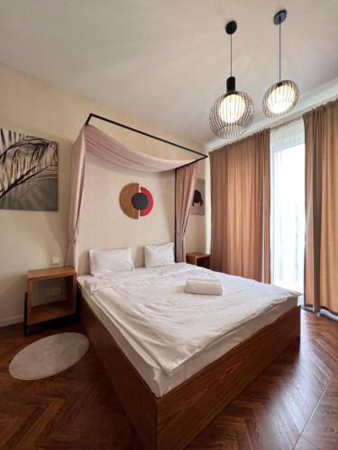 Ένα ή περισσότερα κρεβάτια σε δωμάτιο στο Hotel Manica Esentai City