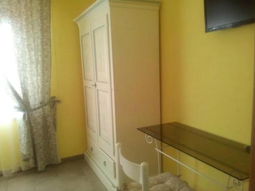 a room with a white cabinet and a window at Nonna Anita Palace Narni in Narni