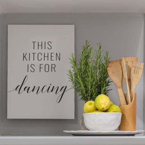 a sign on a shelf with a bowl of lemons at Hoogwater Family House in Wolseley