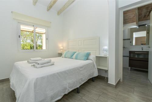 Vuode tai vuoteita majoituspaikassa Villa Les Oliveres Petites de un dormitorio