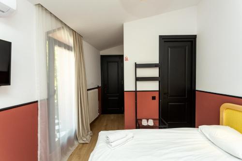 Shota Rustaveli Aparthotelにあるベッド