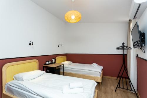 Shota Rustaveli Aparthotelにあるベッド