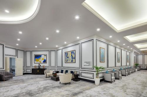 a large room with chairs and a waiting room at Meliá Vinpearl Nha Trang Empire in Nha Trang