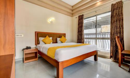 Katil atau katil-katil dalam bilik di Hotel Garden Inn