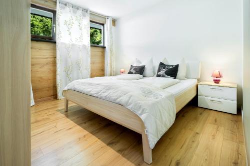 Krevet ili kreveti u jedinici u objektu Apartment Sunnyside Premium by Alpine Host Helpers