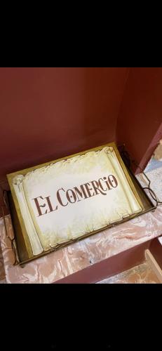 a box with a sign that says el camino at El Comercio in Villarejo del Valle