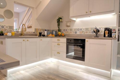 Køkken eller tekøkken på The Belfast Boutique Central Cozy