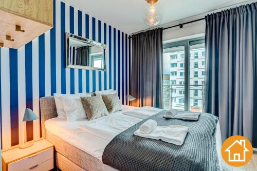 Posteľ alebo postele v izbe v ubytovaní Apartamenty Promenada Gwiazd 28 - visitopl