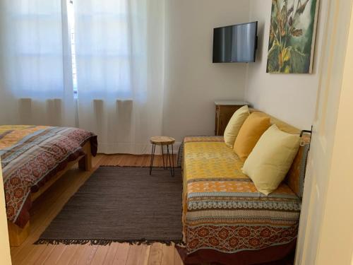 Ένα ή περισσότερα κρεβάτια σε δωμάτιο στο Ferienhaus Mosel 2.0