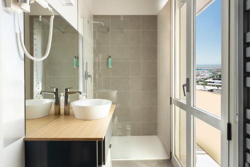 Et badeværelse på Hotel Vela d'Oro