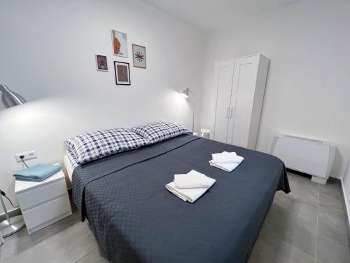 Lujza Apartmanにあるベッド