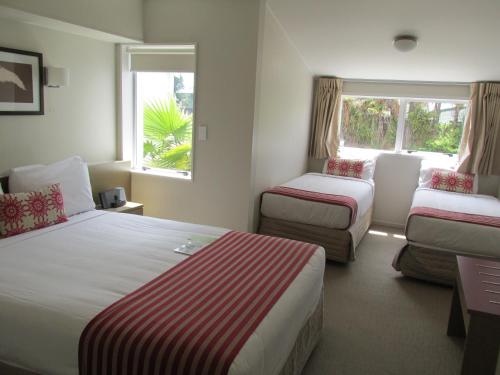 Postel nebo postele na pokoji v ubytování Lake Rotorua Hotel
