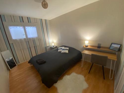 Postel nebo postele na pokoji v ubytování Le gîte de Delphine