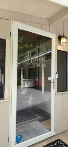 a door to a restaurant with a sign on it at Stay at The Retreat! Gatlinburg-Dollywood in Sevierville