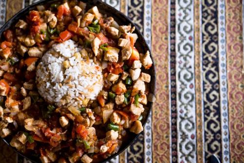 a plate of food with rice and meat and vegetables at Hotel Dort Mevsim in Pamukkale