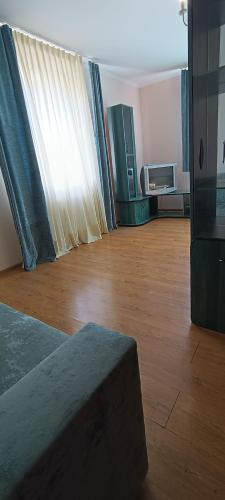 Μια τηλεόραση ή/και κέντρο ψυχαγωγίας στο VIP Apartments in the Centre