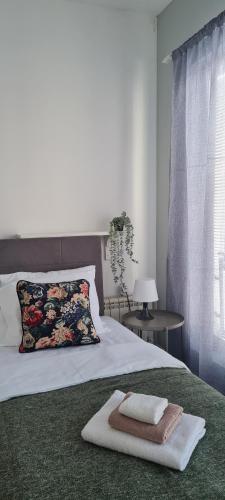 Postel nebo postele na pokoji v ubytování MiniCity Inn